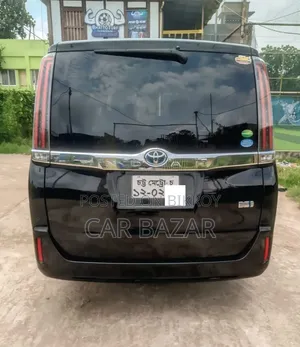 টয়োটা নোয়াহ ১.৮ ফ্রন্ট হুইল ড্রাইভ হাইব্রিড (৭ সিটার) ২০১৯ কালো