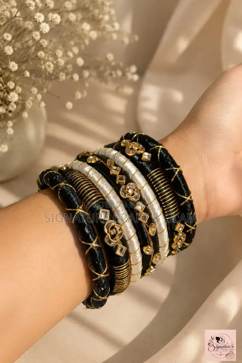 A piece of royalty in silk thread and stone work.