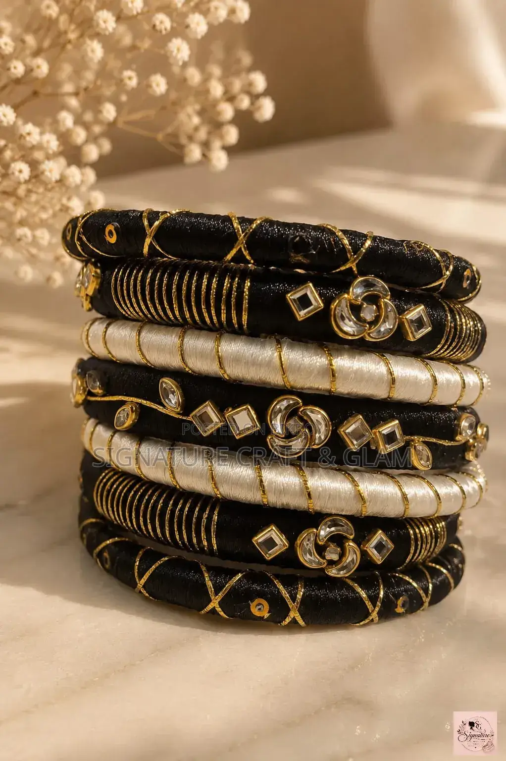 A piece of royalty in silk thread and stone work.