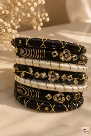 A piece of royalty in silk thread and stone work.