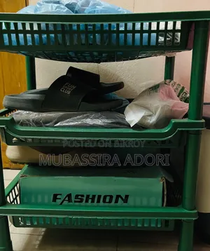 A shoe rack and a trash bin for sale