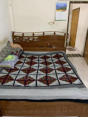 খাট ও ড্রেসিং টেবিল