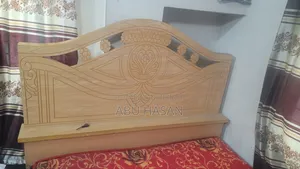 Almost new board bed for sale + including mattress