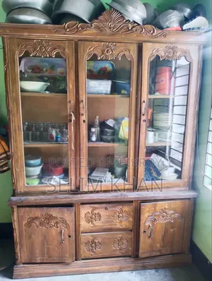 A teak wood showcase will be sold
