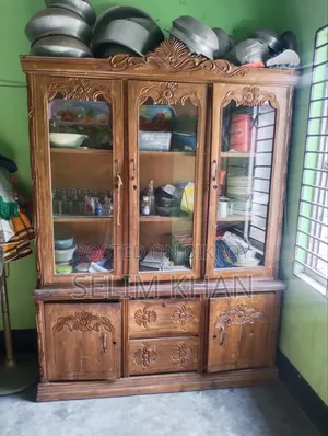 A teak wood showcase will be sold