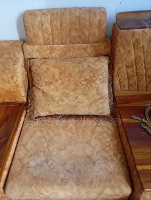 5-seater sofa, corner, and a tea table with tea stand for sale