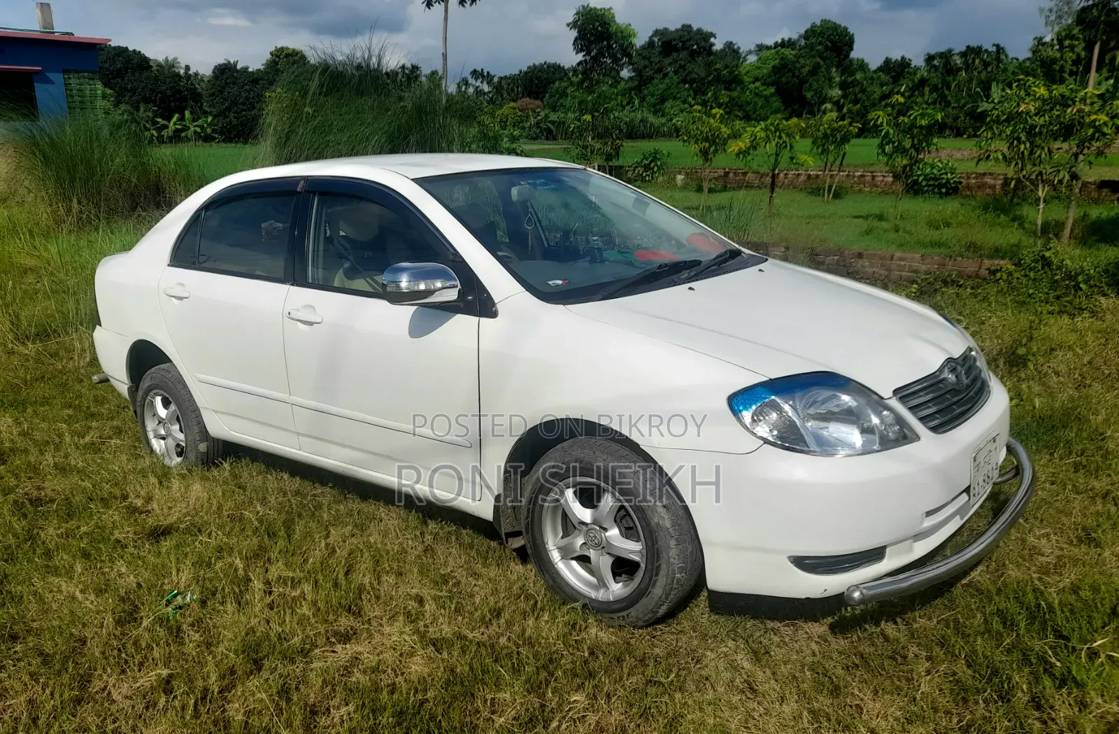 টয়োটা করোলা ২০০৪ সাদা