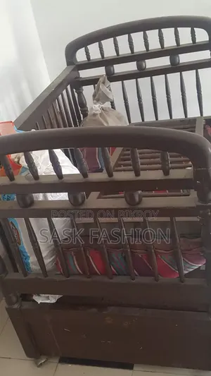 Baby cot with move system, can be moved from one place to another easily.