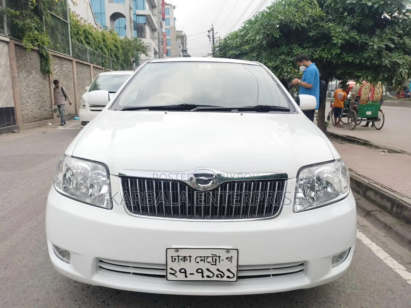টয়োটা করোল্লা সেডান ২০০৫ সাদা