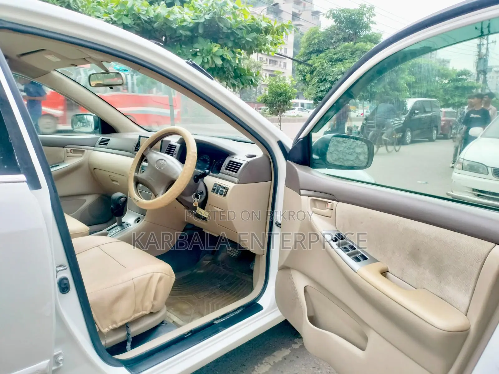 টয়োটা করোল্লা সেডান ২০০৫ সাদা