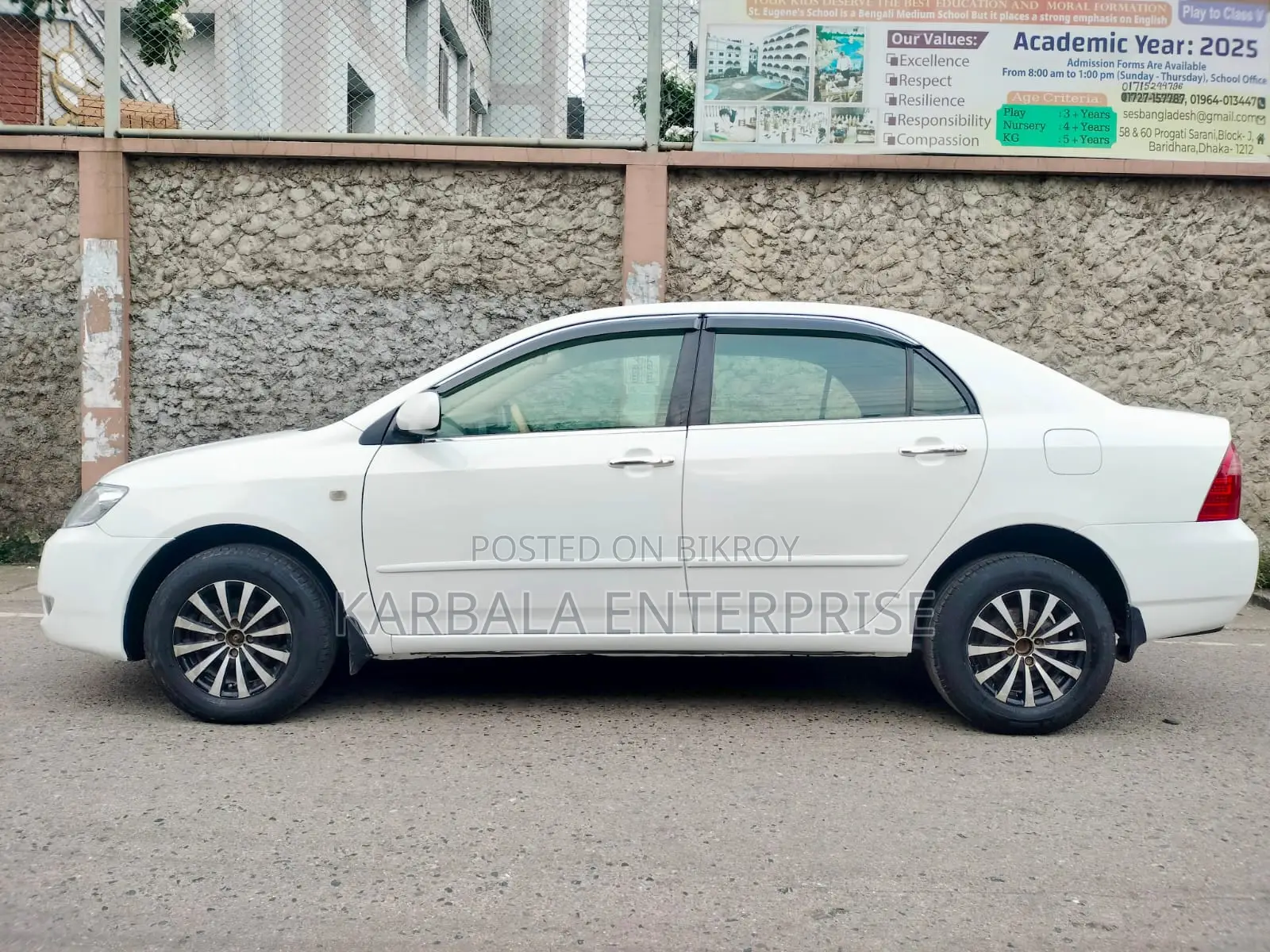 টয়োটা করোল্লা সেডান ২০০৫ সাদা