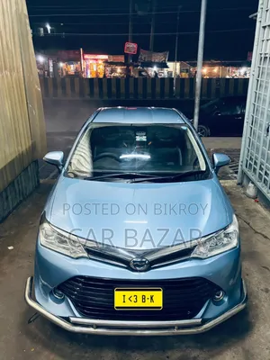 টয়োটা অ্যাক্সিও ১.৫ হাইব্রিড জি টুডব্লিউডি ২০১৫ গ্রিন