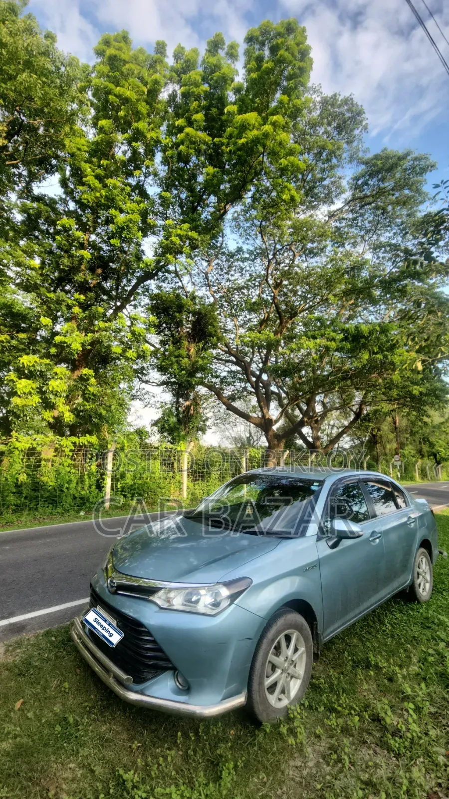 টয়োটা অ্যাক্সিও ১.৫ হাইব্রিড জি টুডব্লিউডি ২০১৫ গ্রিন
