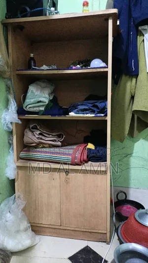 A table and a small wardrobe