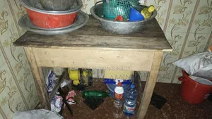 A table and a small wardrobe