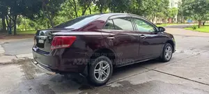টয়োটা অ্যালিয়ন ২০১০ মেরুন