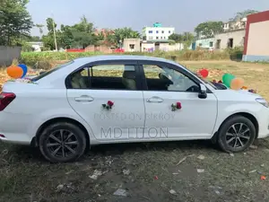 টয়োটা অ্যাক্সিও ১.৫ জি টুডব্লিউডি ২০১৫ সাদা