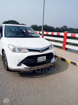 টয়োটা অ্যাক্সিও ১.৫ জি টুডব্লিউডি ২০১৫ সাদা