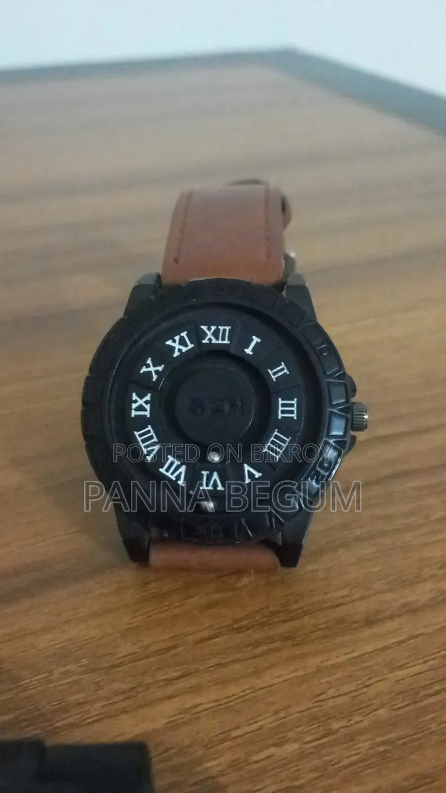 This is a magnetic Roman numeral watch.