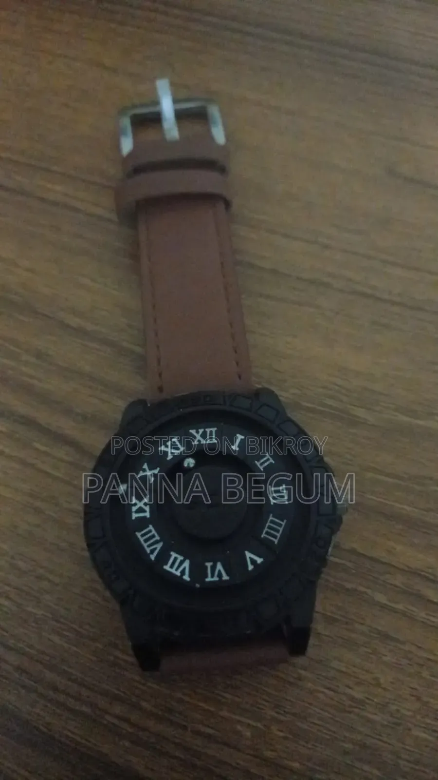 This is a magnetic Roman numeral watch.