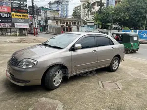 টয়োটা করোল্লা সেডান অটোমেটিক ২০০৩ গোল্ড