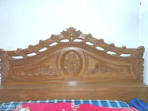 Teak wood bed with beautiful carved design