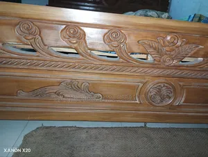 Teak wood bed with beautiful carved design