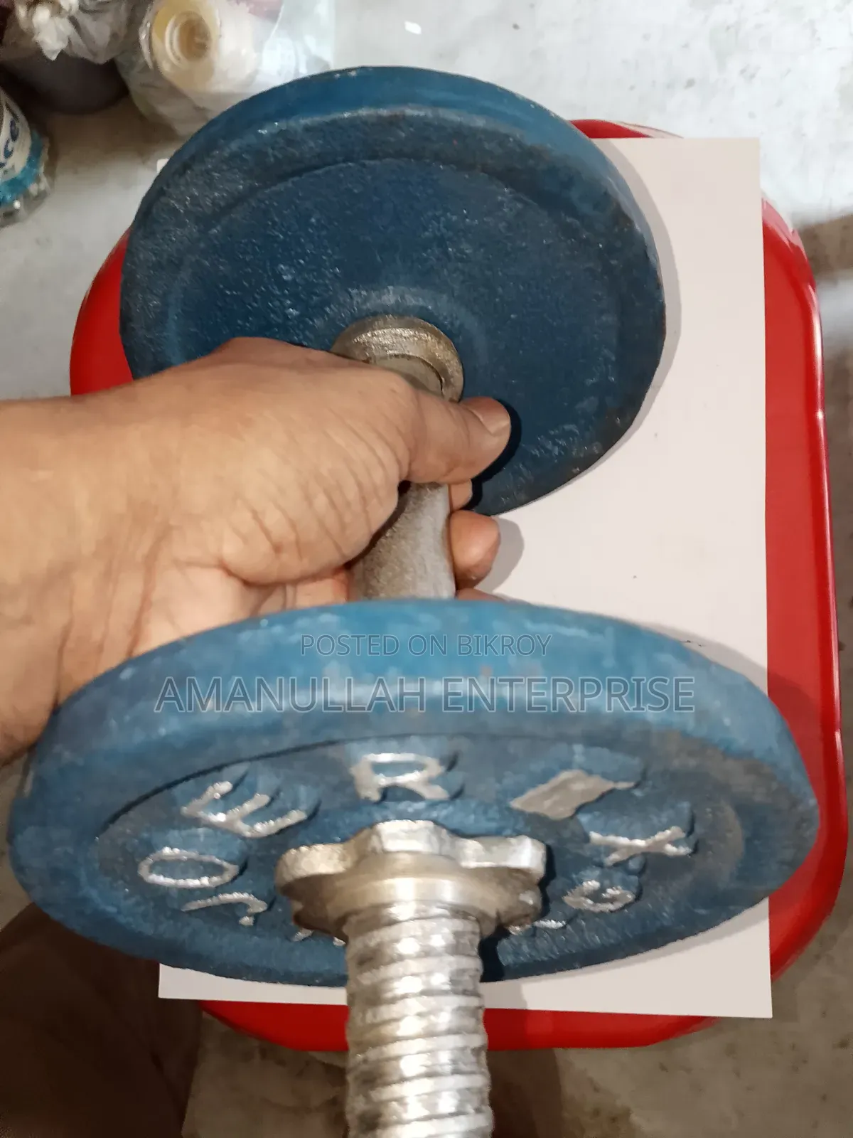 প্রিমিয়াম অ্যাডজাস্টেবল কাস্ট আয়রন ডাম্বেল উইথ স্পিনলক কলার্স।