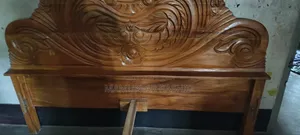Sale of a Mahogany Wooden Bed