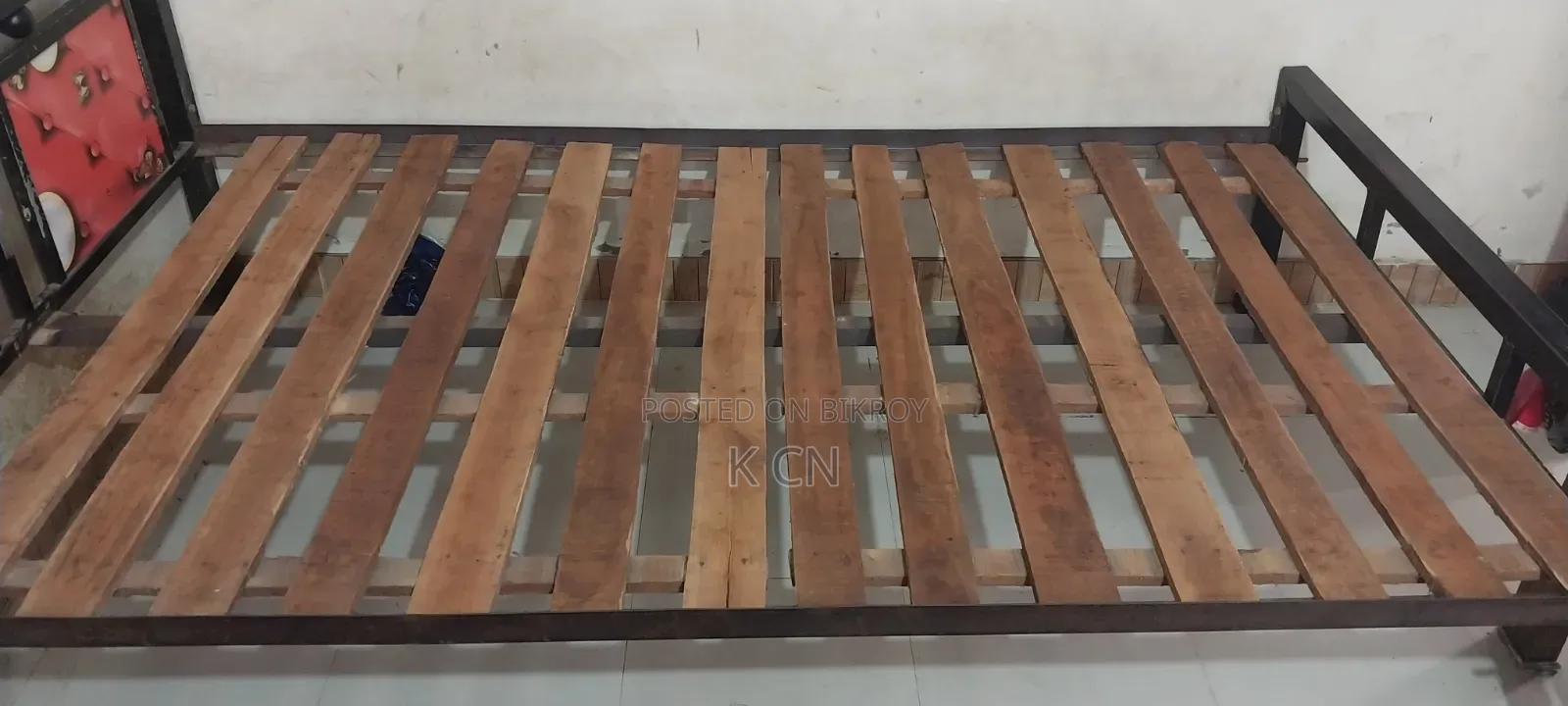 Semi-double steel bed for sale.