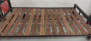 Semi-double steel bed for sale.