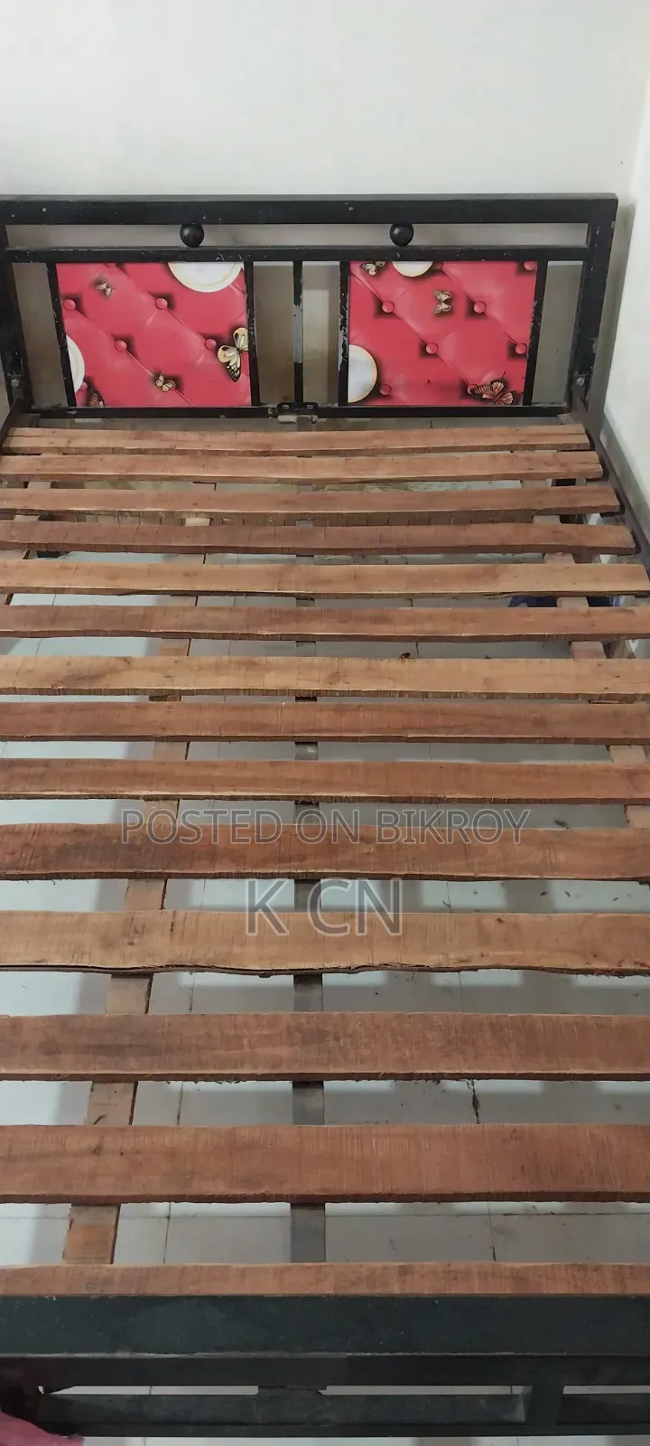 Semi-double steel bed for sale.