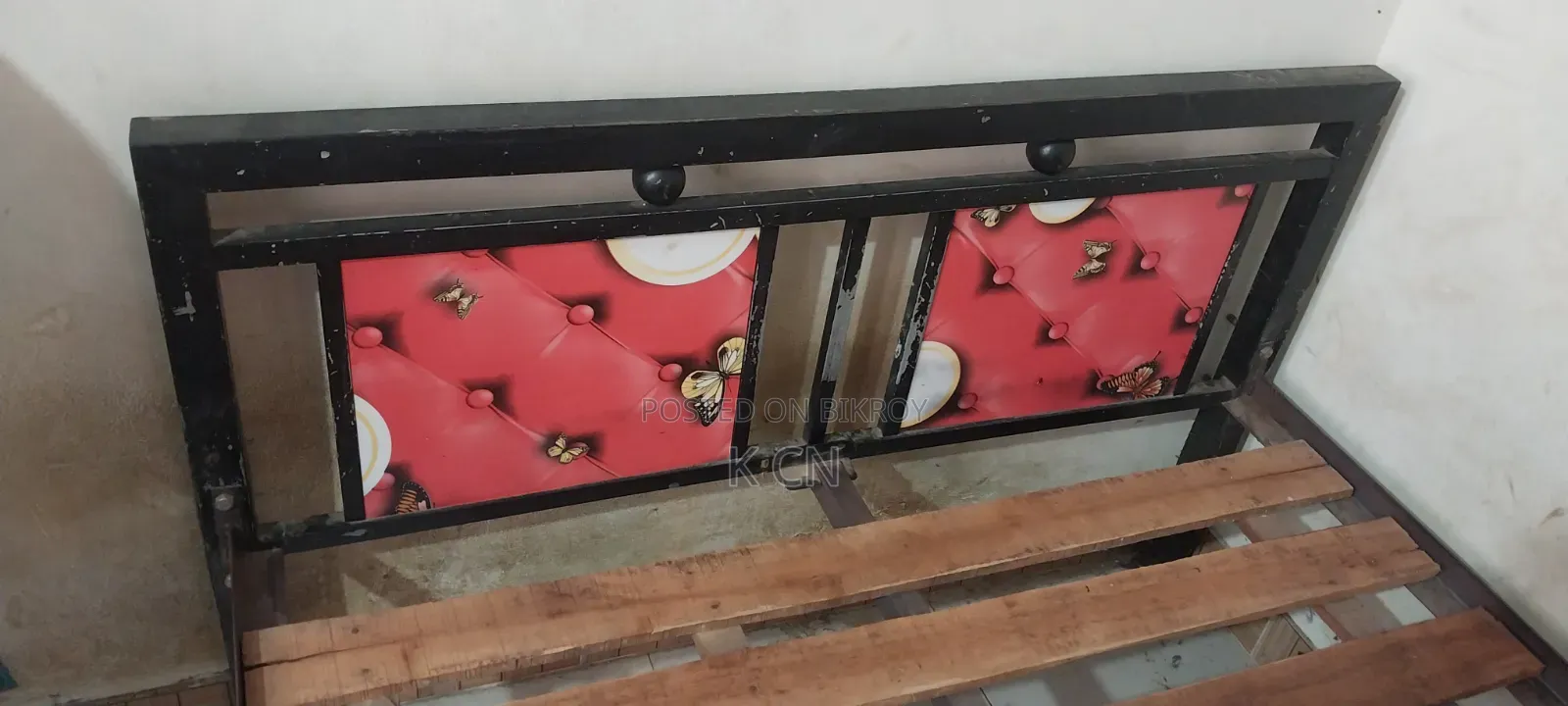 Semi-double steel bed for sale.
