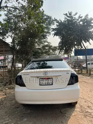 টয়োটা এক্সিও ২০১২ সাদা