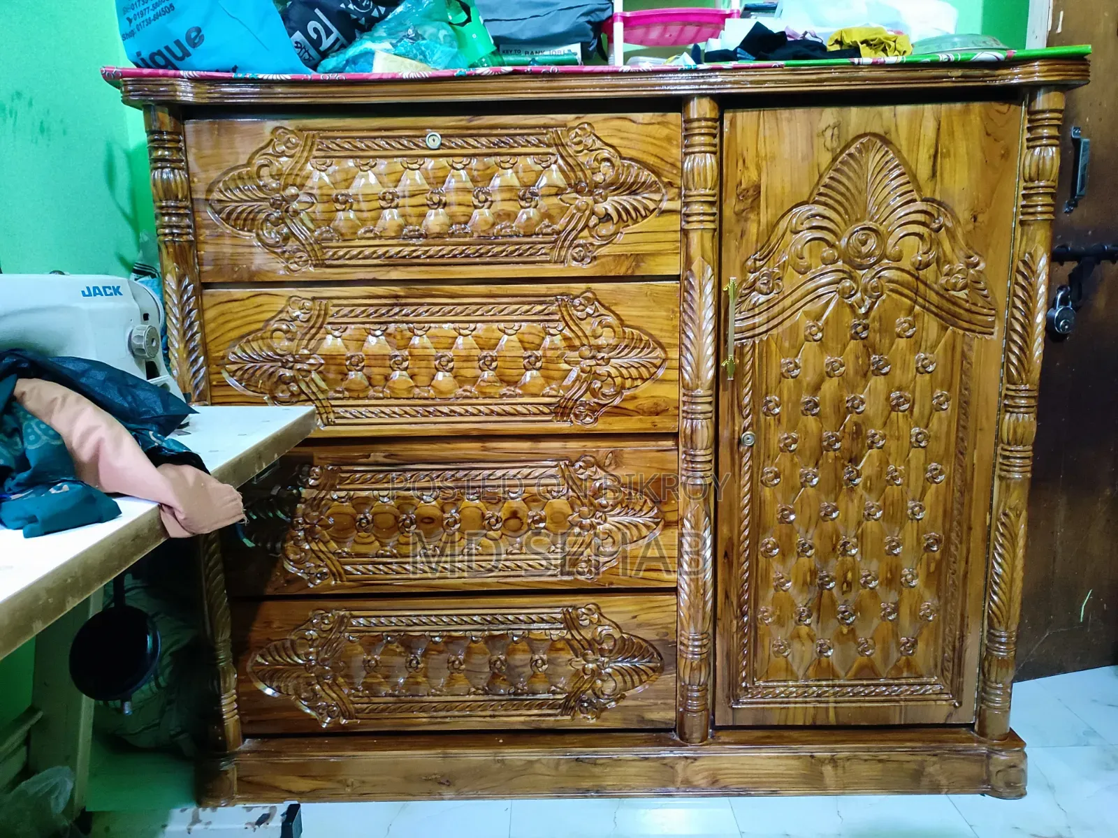 A 4 feet by 5 feet teak wood wardrobe will be sold.