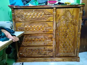 A 4 feet by 5 feet teak wood wardrobe will be sold.
