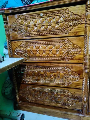 A 4 feet by 5 feet teak wood wardrobe will be sold.