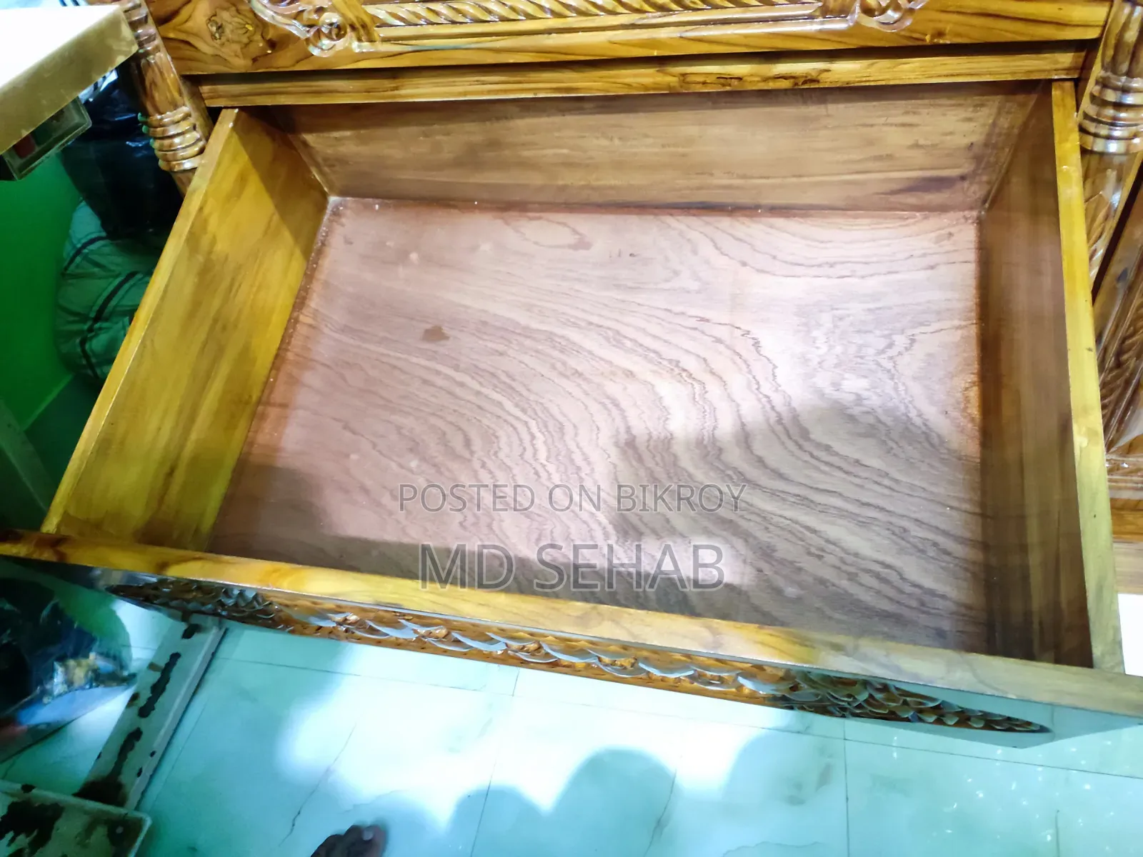 A 4 feet by 5 feet teak wood wardrobe will be sold.