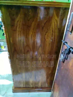 A 4 feet by 5 feet teak wood wardrobe will be sold.