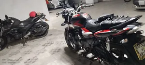 বাজাজ ডিসকভার ১২৫ ২০২১ লাল