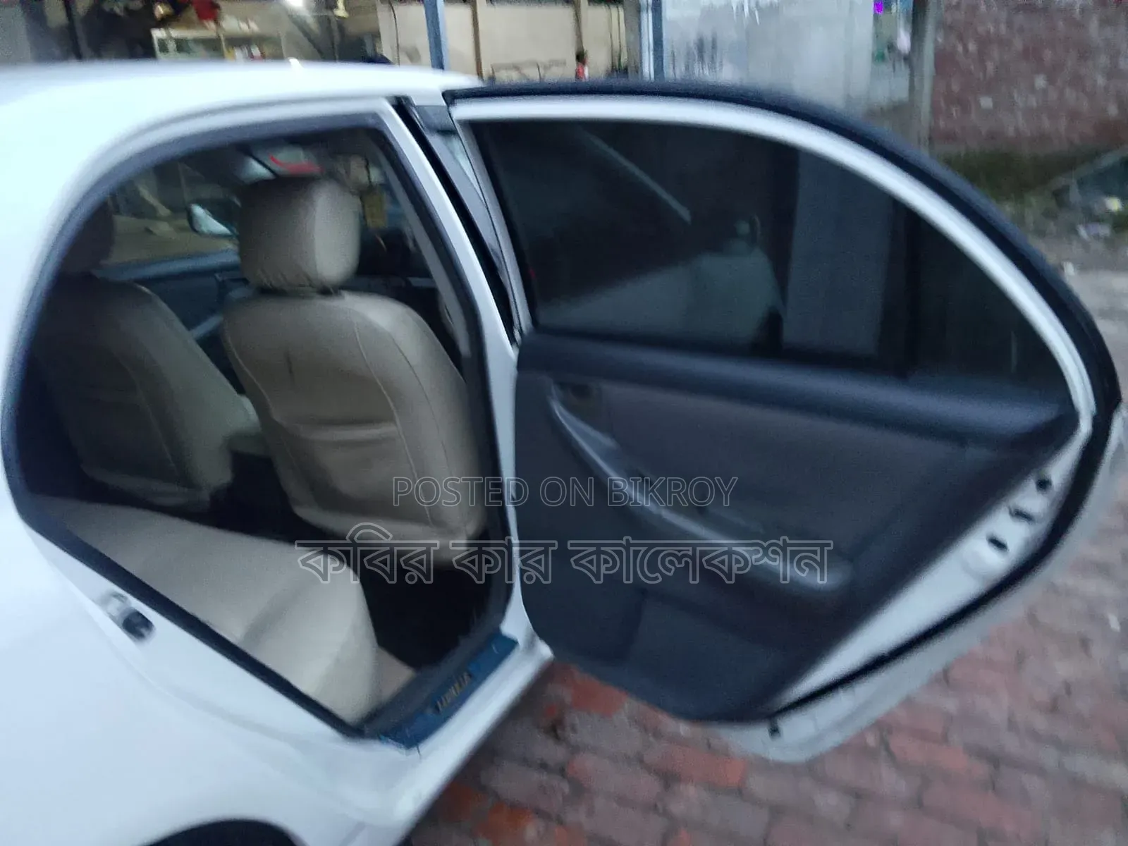টয়োটা করোল্লা ২০০৪ সাদা