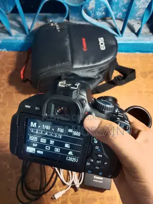 Canon EOS 650D (Rebel T4i) DSLR Camera + 55-250mm Lens