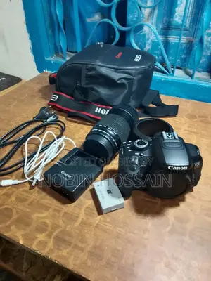 Canon EOS 650D (Rebel T4i) DSLR Camera + 55-250mm Lens