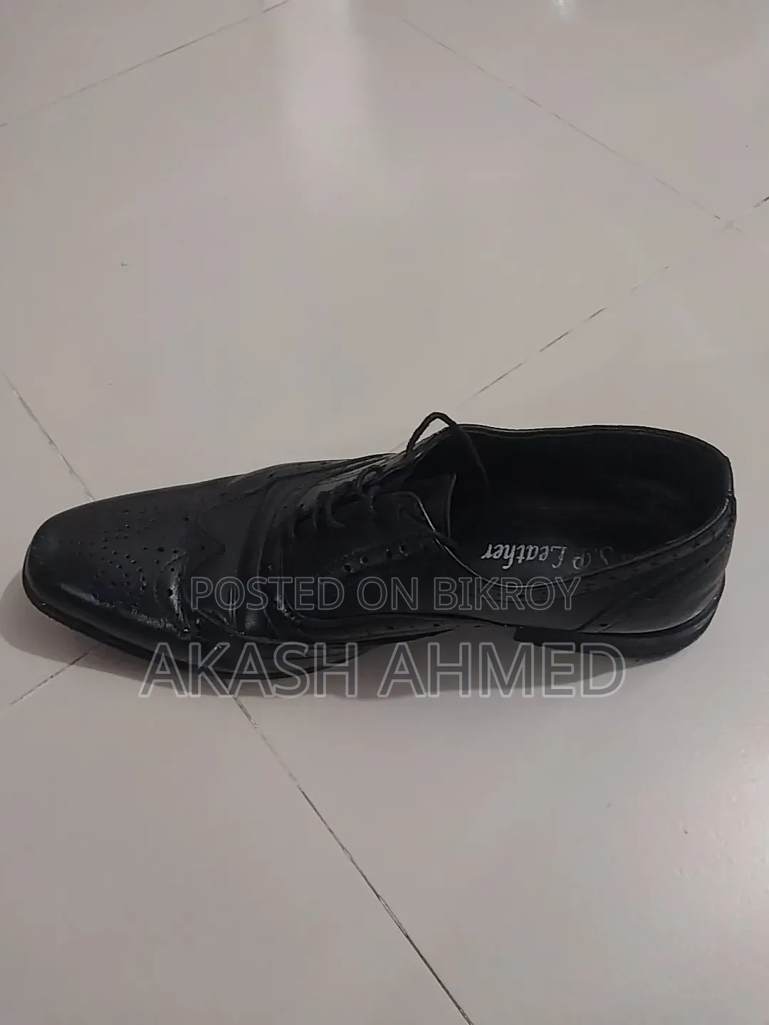 A pair of 100% leather shoes for sale