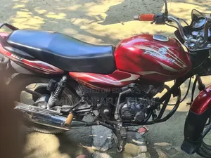 বাজাজ ডিসকভার ১০০ ২০১৪ লাল