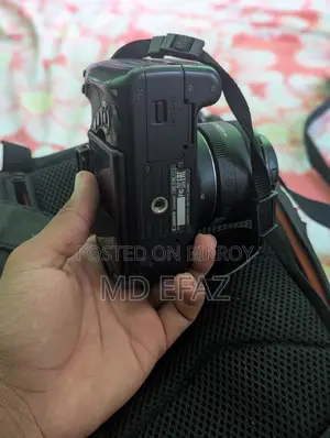 Canon EOS Kiss X7i With 50mm 75-300mm Lens