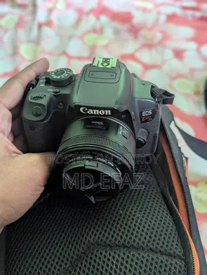 Canon EOS Kiss X7i With 50mm 75-300mm Lens