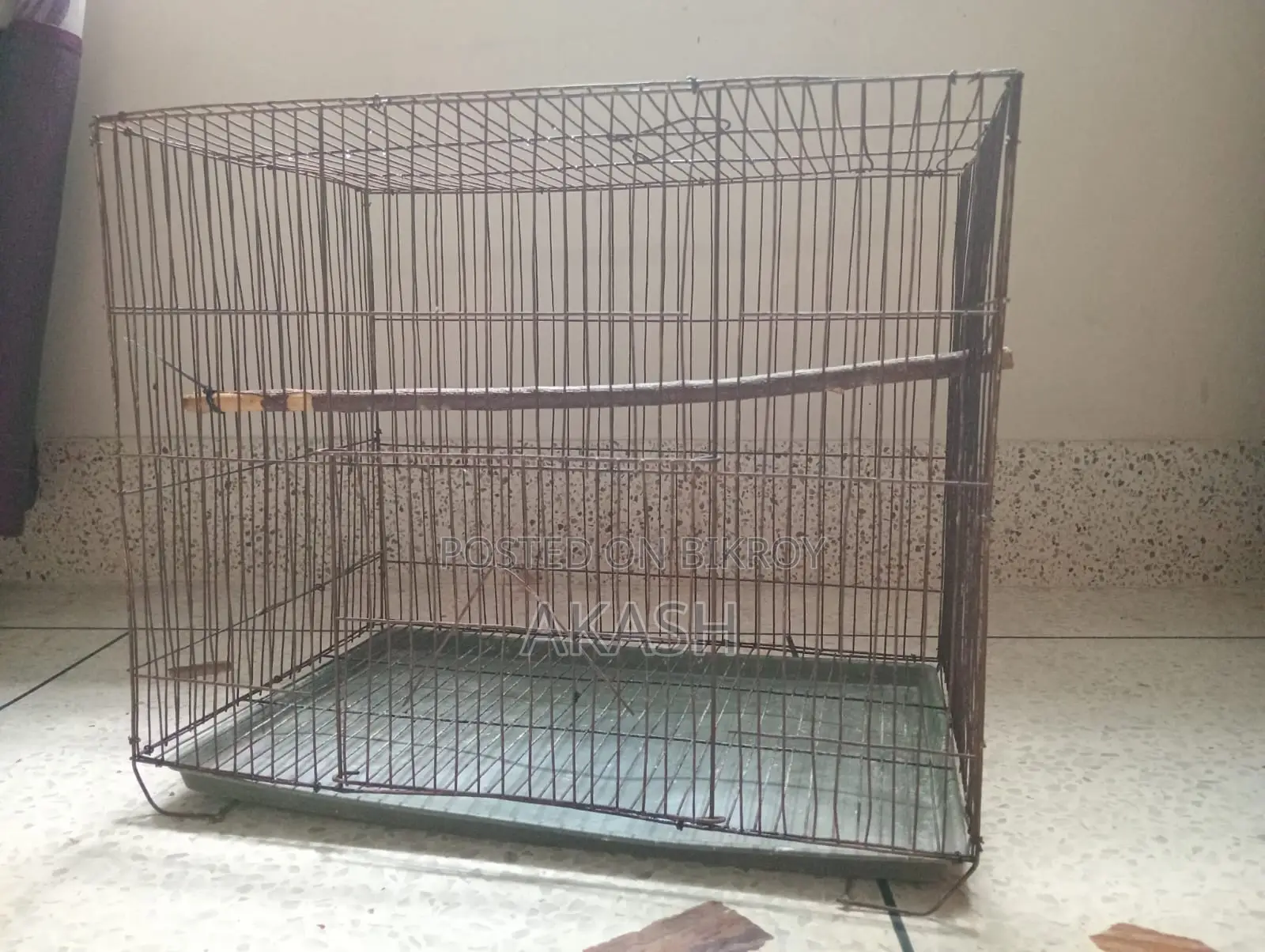 A bird cage will be sold at a low price