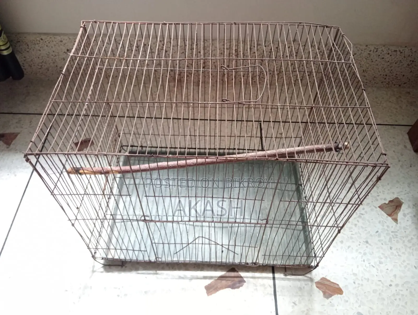 A bird cage will be sold at a low price