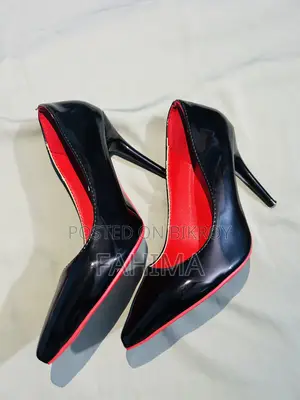 Black Patent Leather Stiletto Pumps With Red Lining